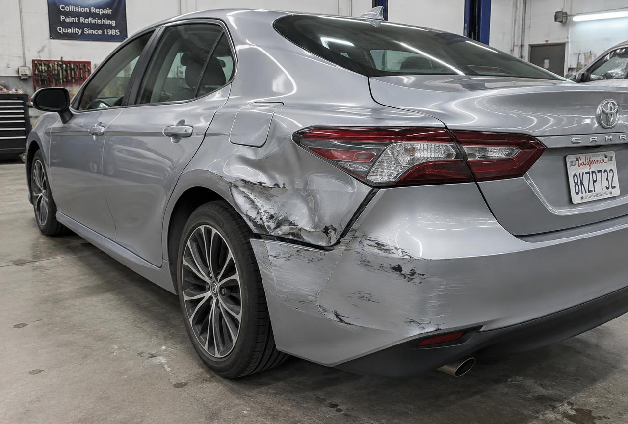 2021 Toyota Camry rear quarter panel repair — before repair